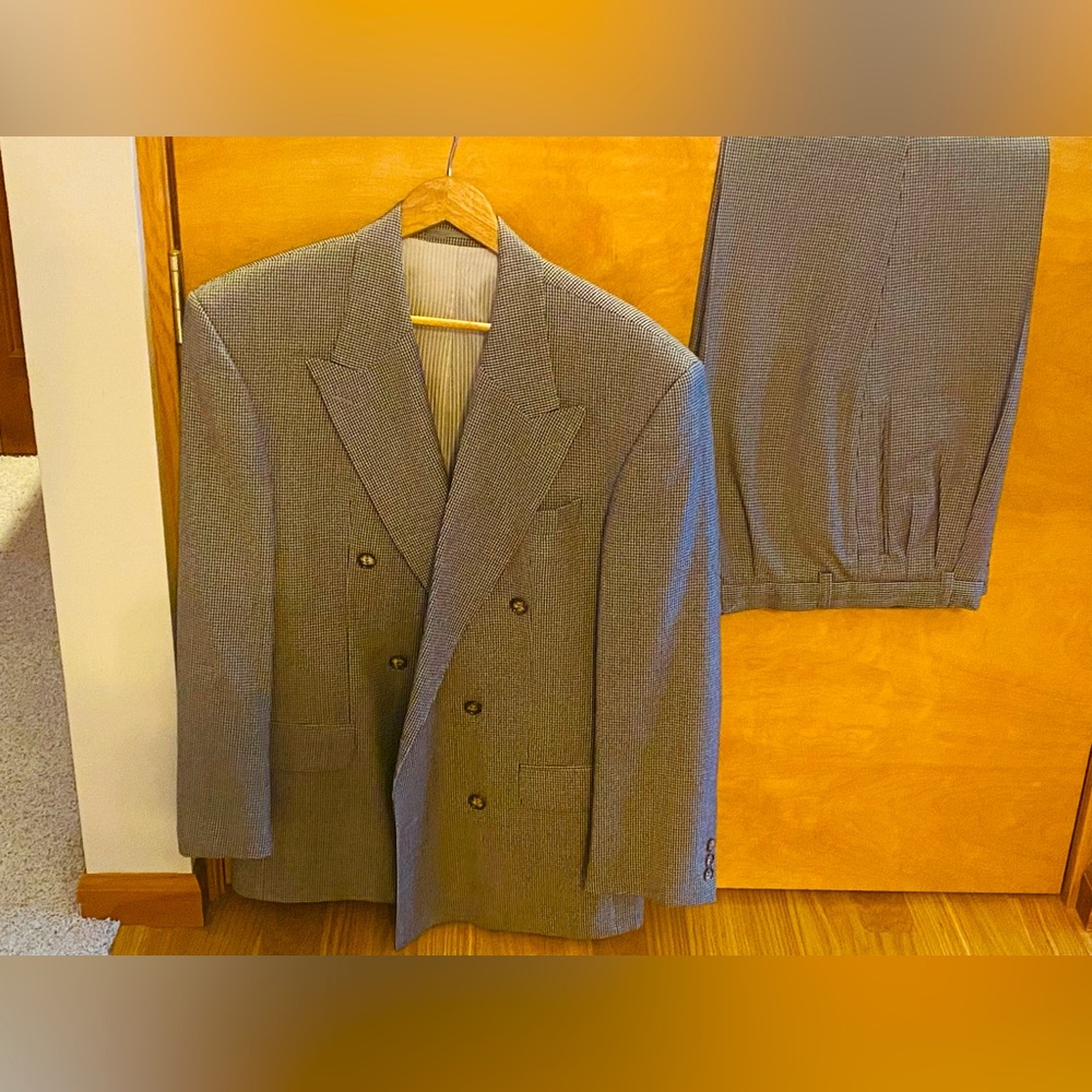 Double breasted pure new wool suit from Italy.
